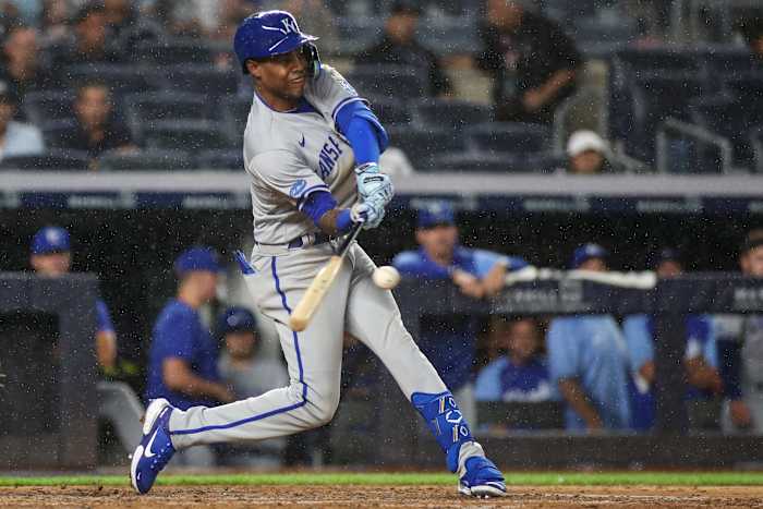 Jul 29, 2022; Bronx, New York, USA; Kansas City Royals shortstop Maikel Garcia (11) hits a single in the fifth inning against the New York Yankees at Yankee Stadium. Mandatory Credit: Wendell Cruz-USA TODAY Sports